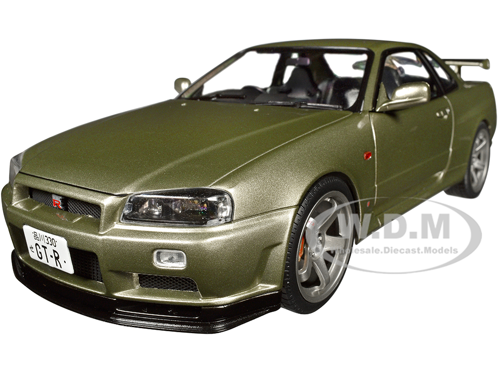 Image of 1999 Nissan Skyline GT-R (R34) RHD (Right Hand Drive) Green Metallic 1/18 Diecast Model Car by Solido