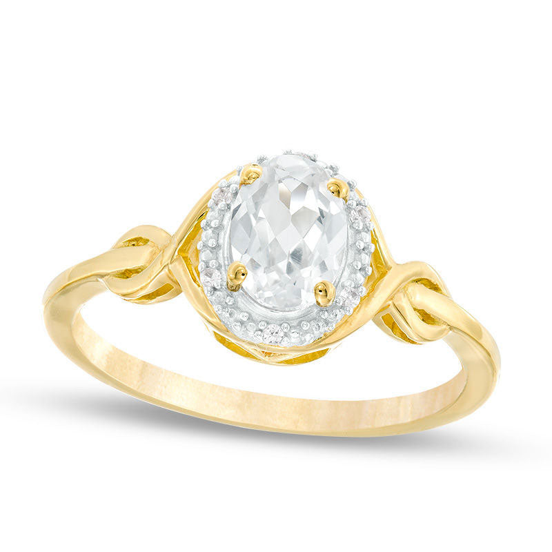 Image of ID 1 Oval Lab-Created White Sapphire and Diamond Accent Twist Ring in Solid 10K Yellow Gold