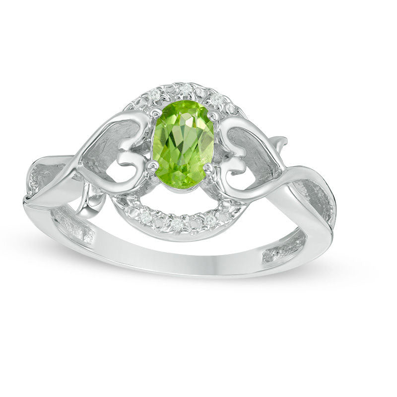 Image of ID 1 Oval Peridot and Natural Diamond Accent Frame Heart Sides Ring in Sterling Silver